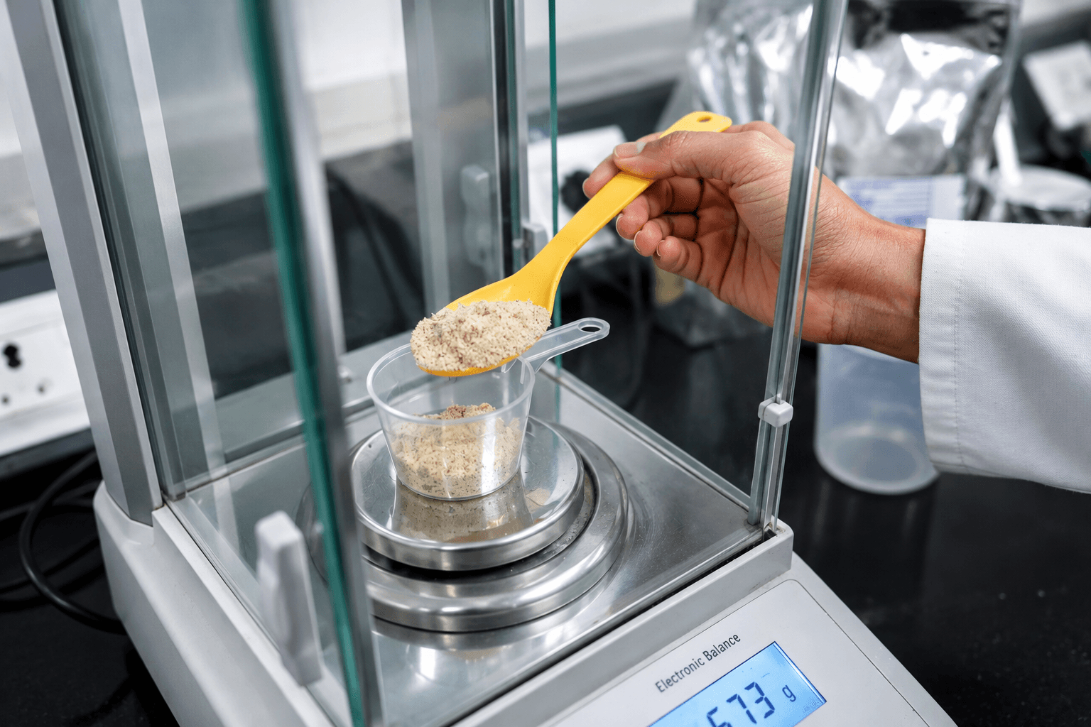 Weighing raw ingredients for a formulation trial